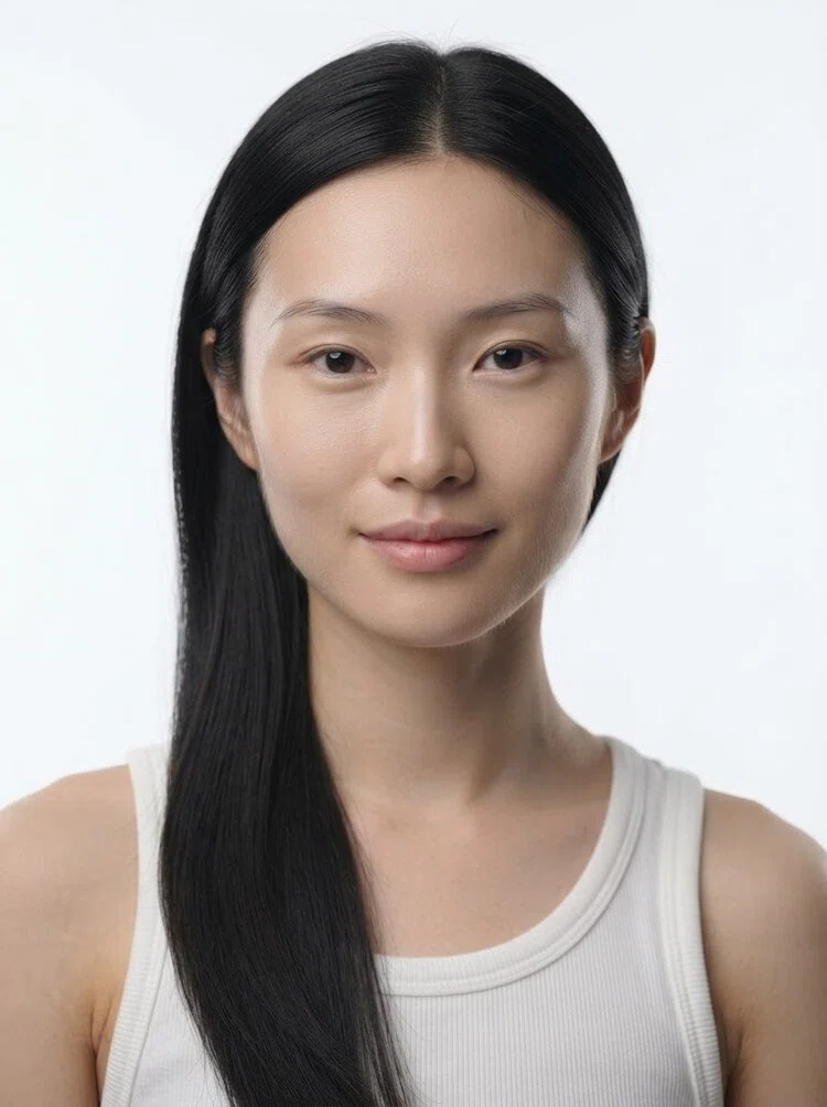 Young female fashion model with long black hair