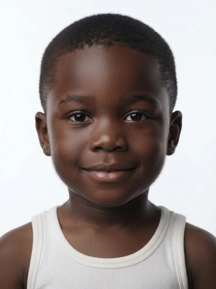 Young male fashion model with short buzzed black hair, close-up.