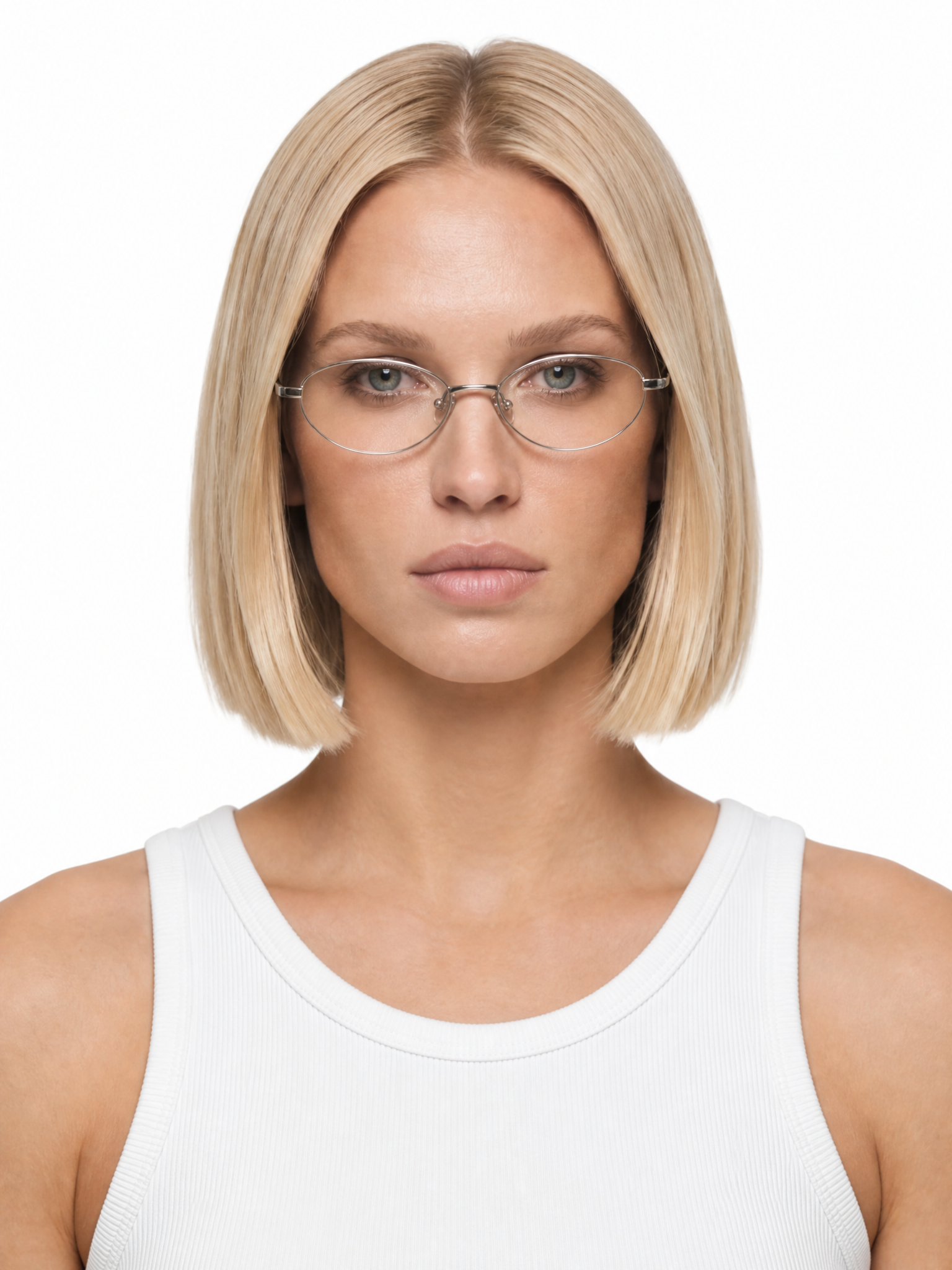 Young female fashion model with a chin-length blonde bob and thin-frame glasses.