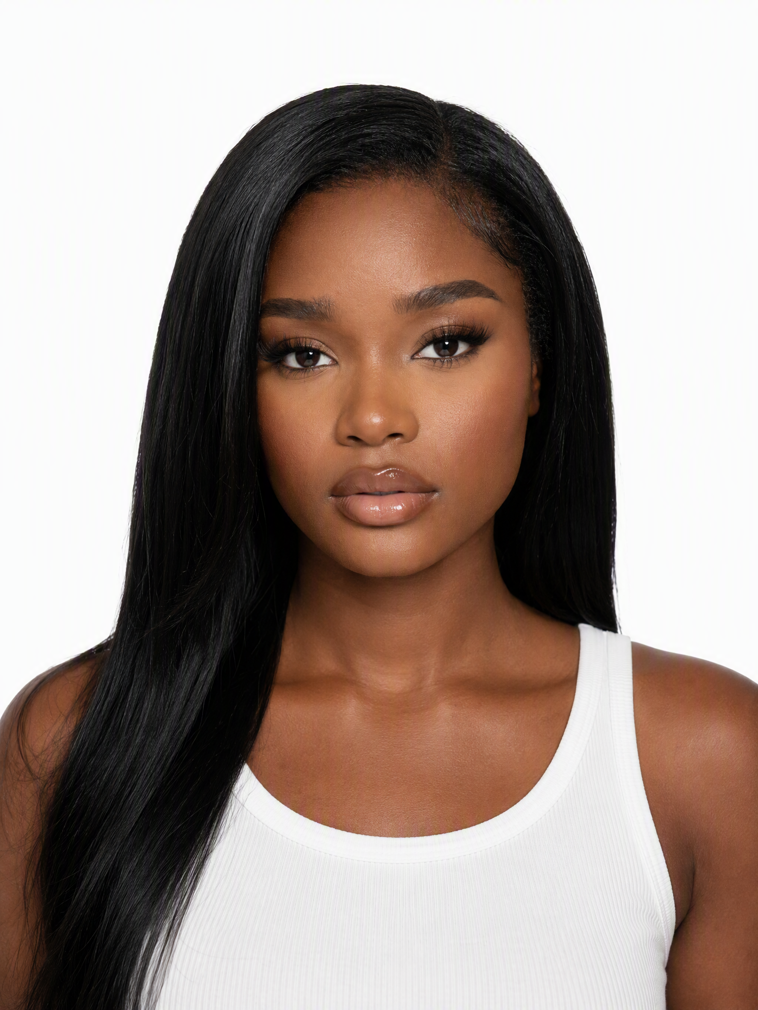Young female fashion model with very long, sleek black hair.